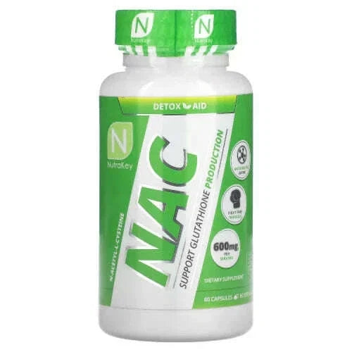 A white plastic bottle of NutriKey NAC dietary supplement with a green cap and a green and white label, containing 60 capsules.