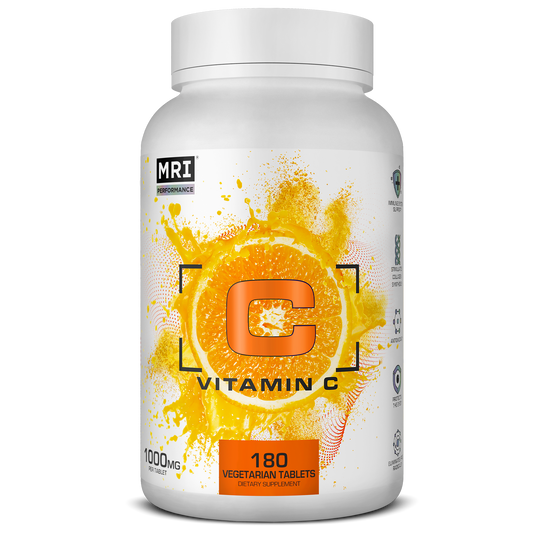 A white plastic bottle of Vitamin C dietary supplement with a white cap, featuring a label with a vibrant orange and yellow citrus graphic and text indicating 180 vegetarian tablets.