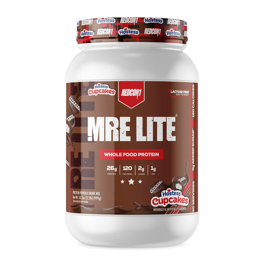 A white plastic tub of Redcon1 MRE Lite whole food protein powder by Harber's Cupcakes, featuring a brown label with white and red text, set against a plain white background.