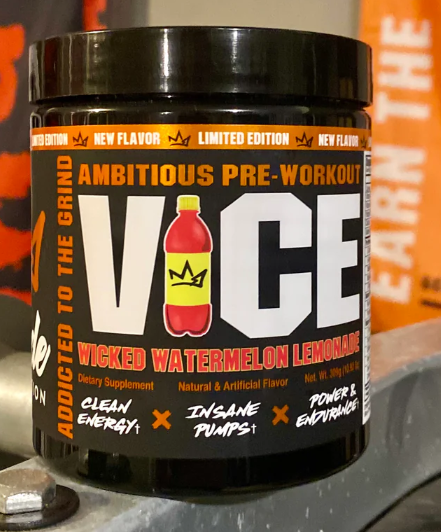 Pre-workout supplement container labeled 'VICE' with promotional text on a blurred background